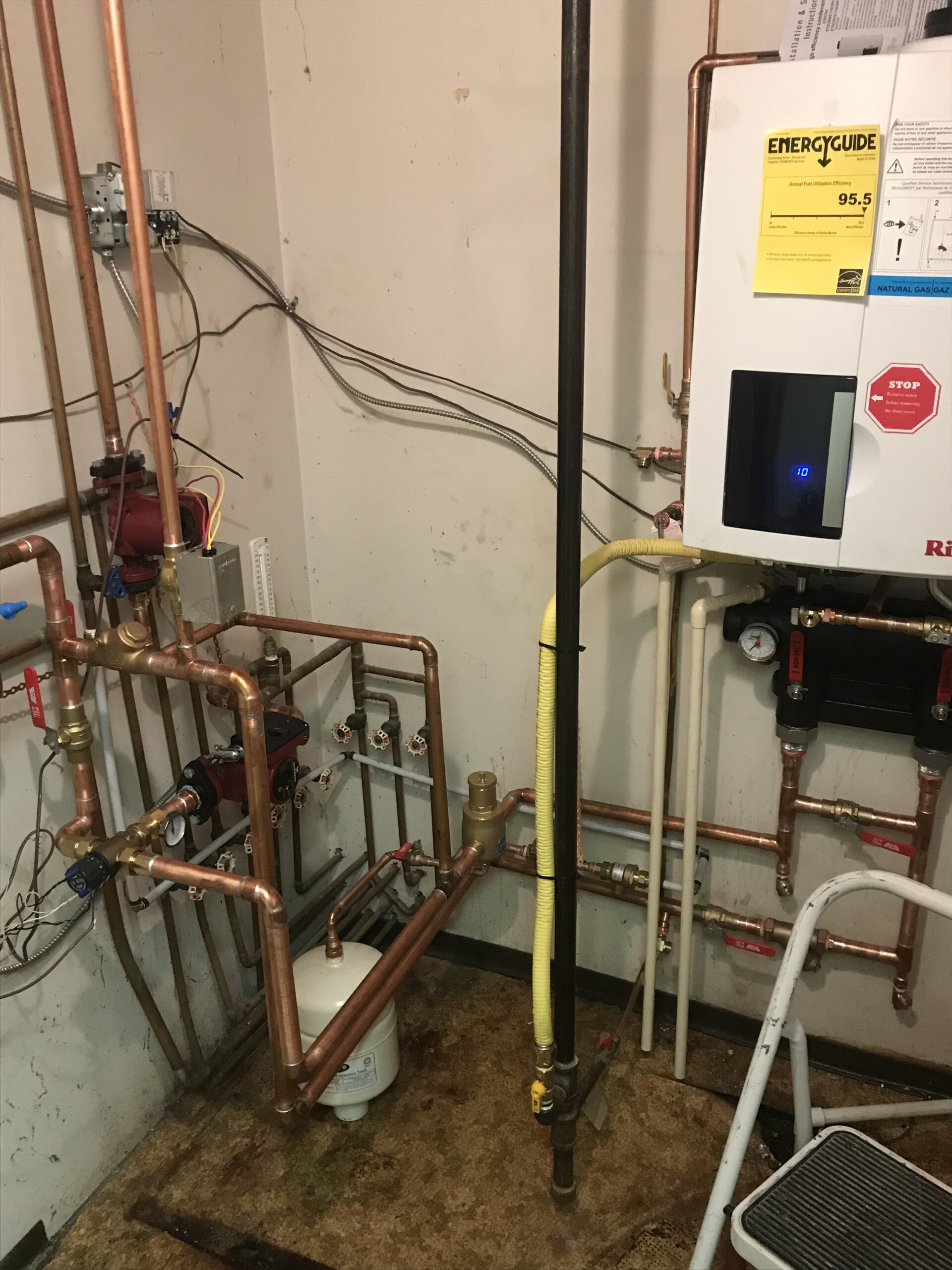 Technician performing annual boiler maintenance checklist