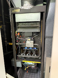 Furnace repair Burnaby showing common components like blower motor, control board, and ignition parts