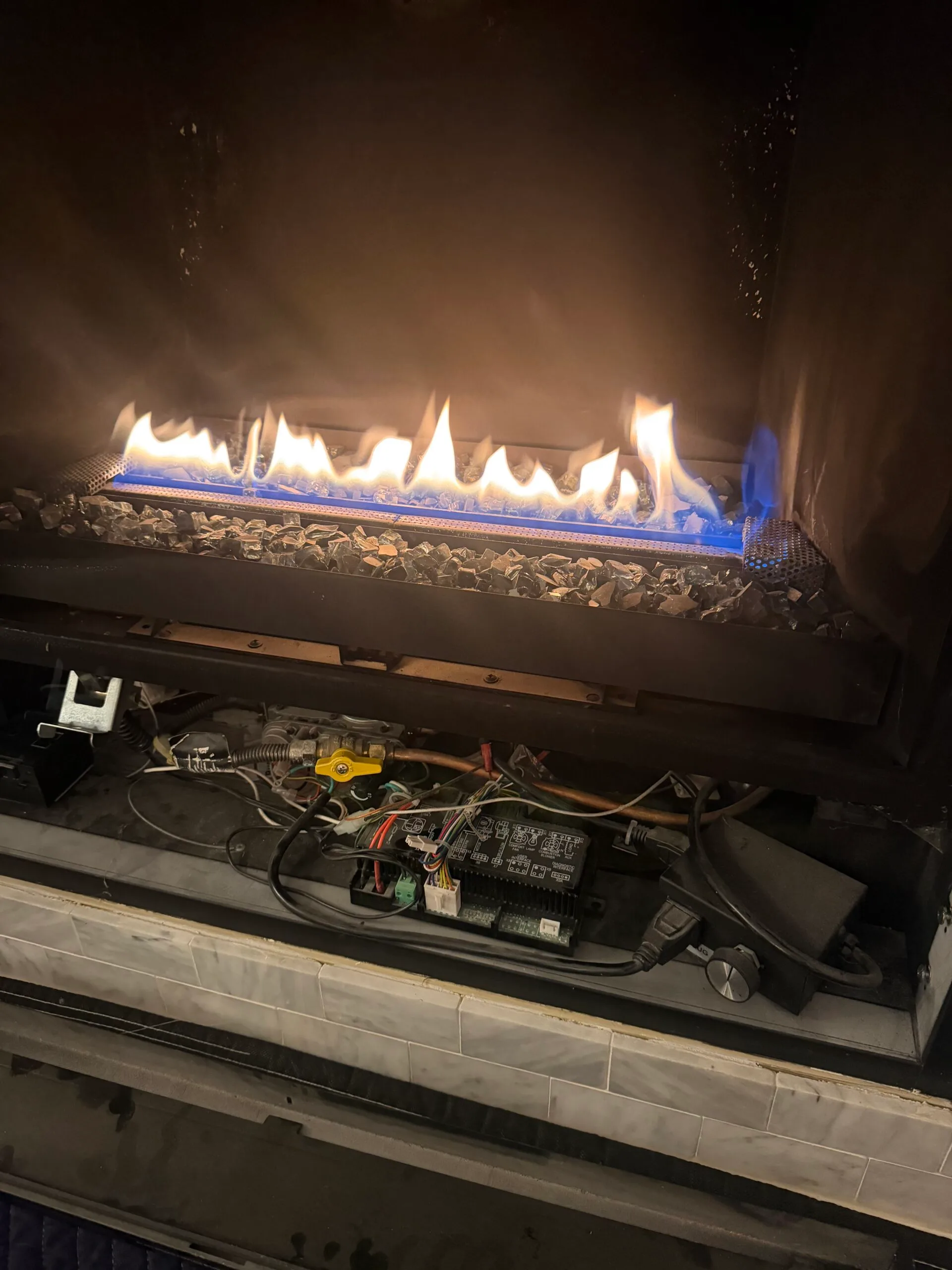Gas fireplace maintenance and cleaning in a Burnaby home