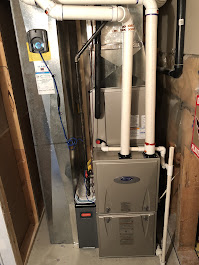 Furnace repair and venting adjustment work in a Coquitlam, BC home