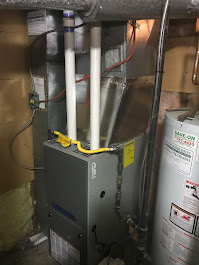 Furnace inspection and safety check in a Vancouver, BC mechanical room