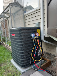 Air conditioning services installation on residential outdoor unit