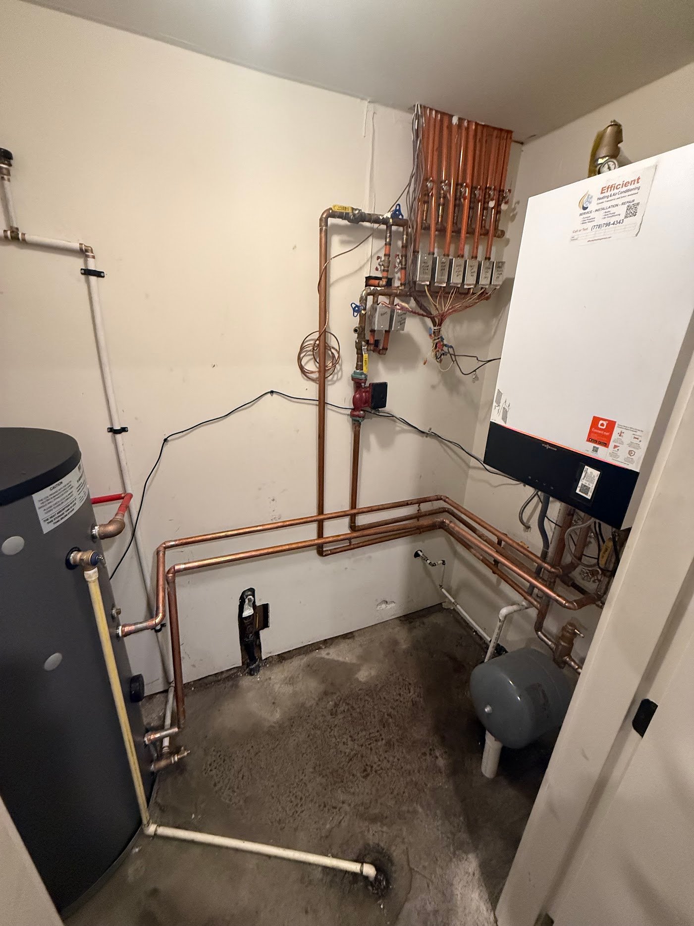 Original hydronic boiler system photographed during a Port Moody boiler service visit