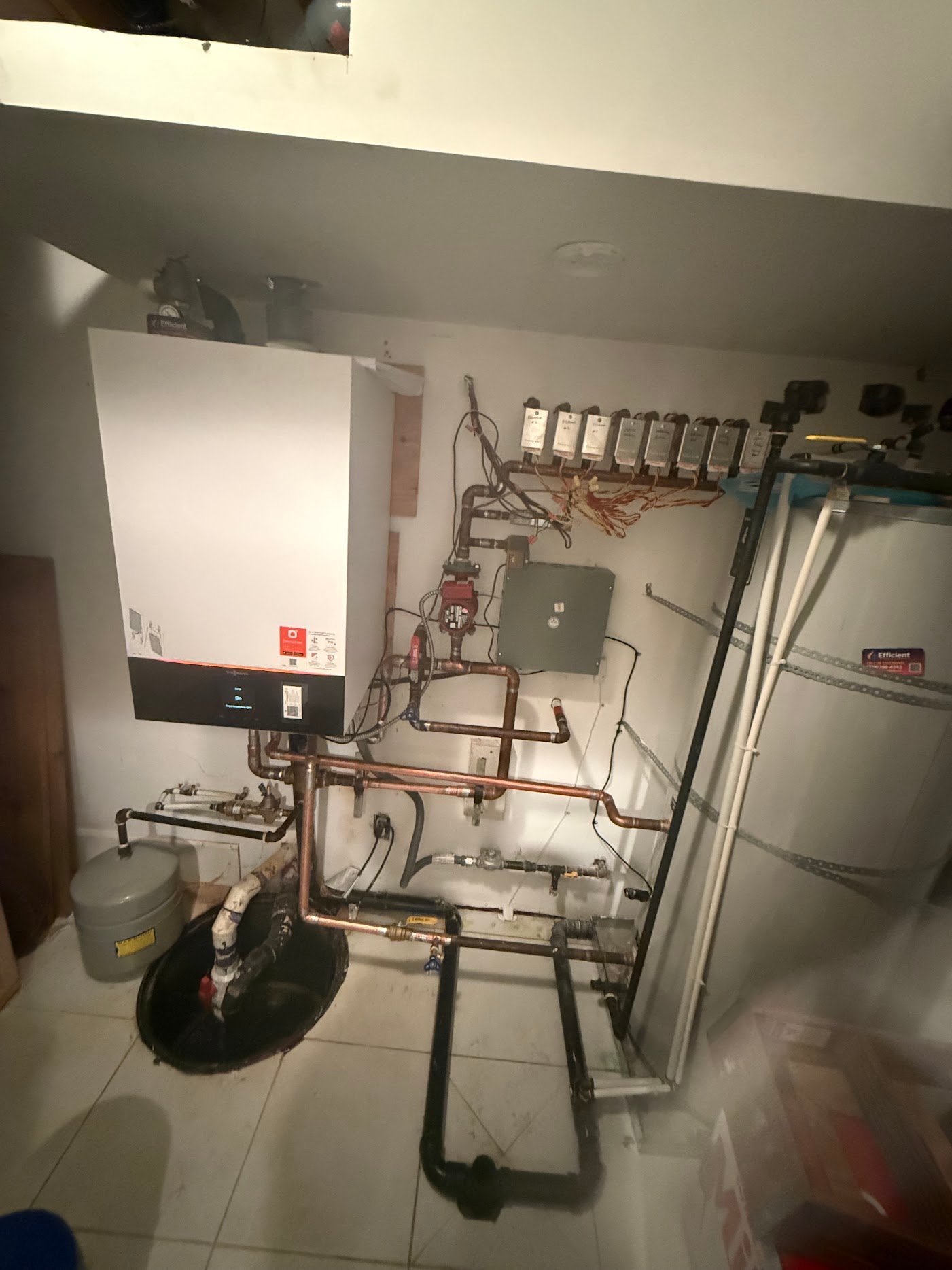 Multi-zone hydronic boiler and indirect tank documented during boiler service planning in Tsawwassen