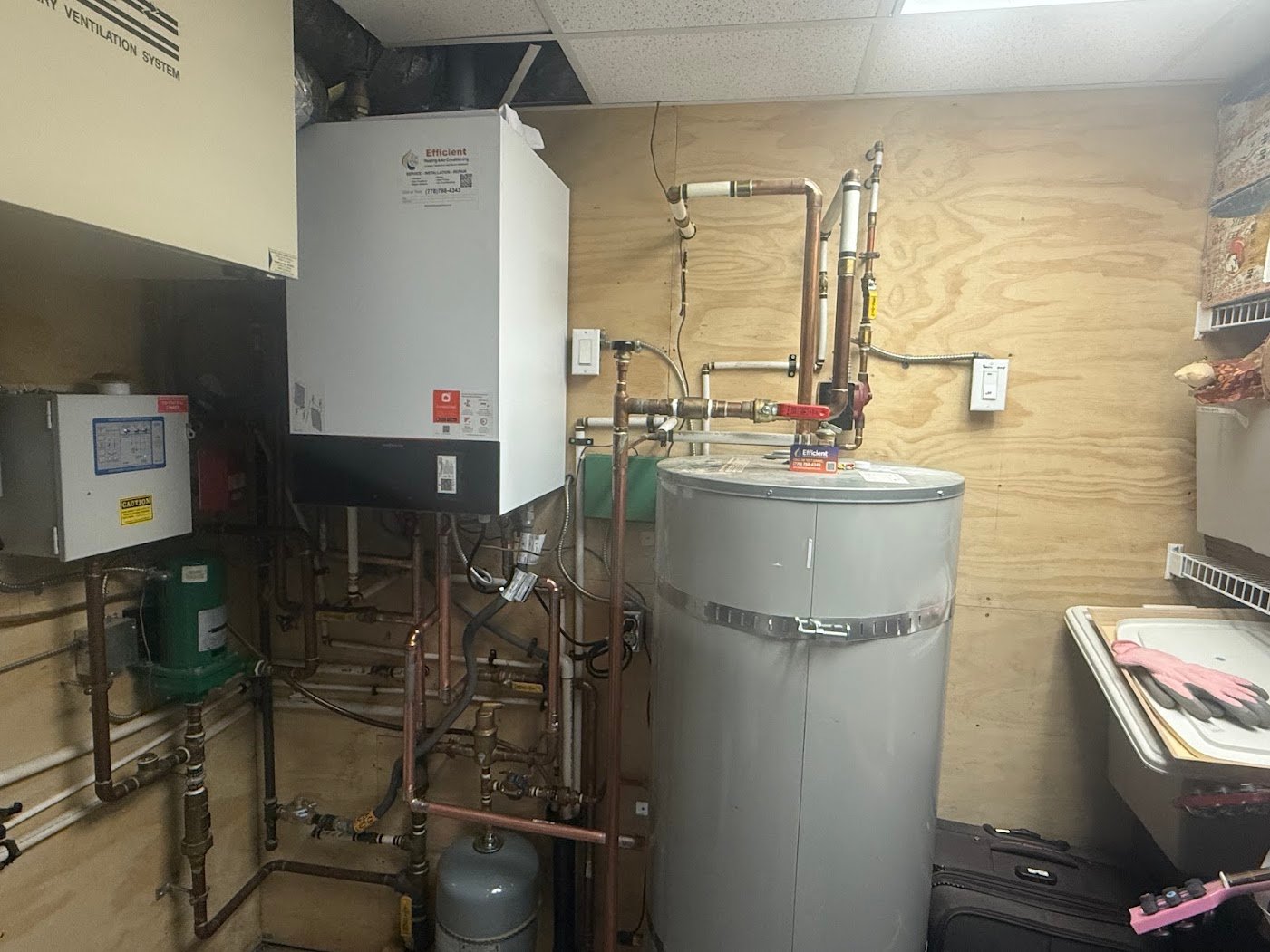 Anmore Boiler Service — Viessmann Hydronic System Check Technician servicing a Viessmann hydronic boiler system for an Anmore home