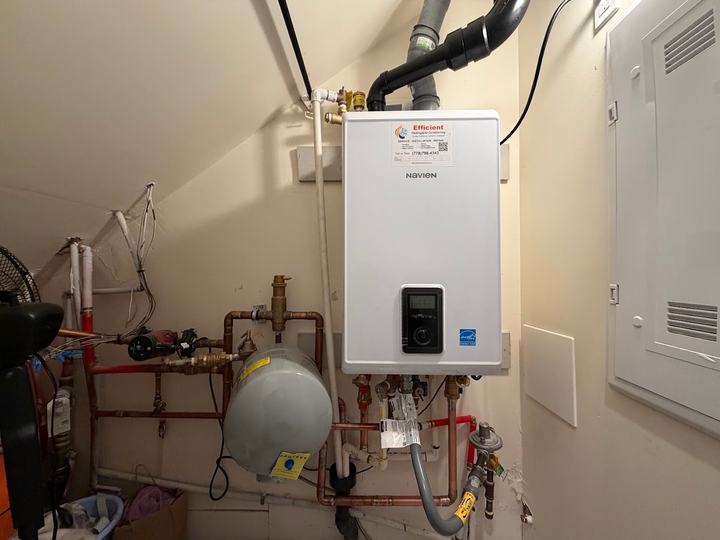 Navien hydronic boiler, expansion tank and circulation piping inspected for boiler service in Richmond