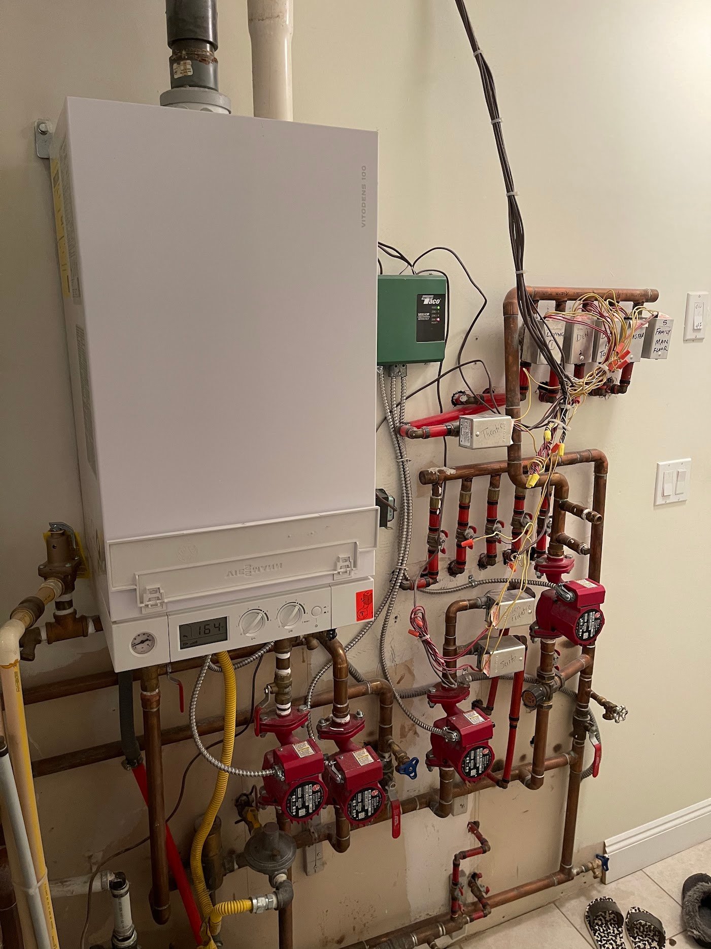 Boiler with hydronic zone controls and pumps photographed for Surrey boiler service